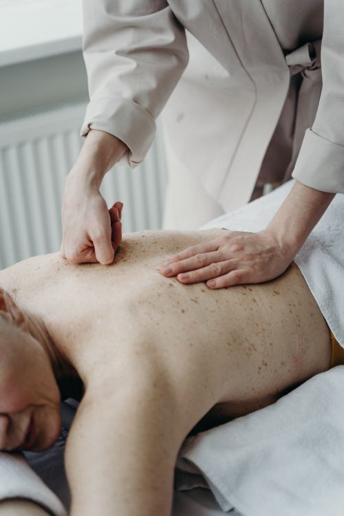 Free A calming massage session focusing on relaxation and wellness indoors. Stock Photo