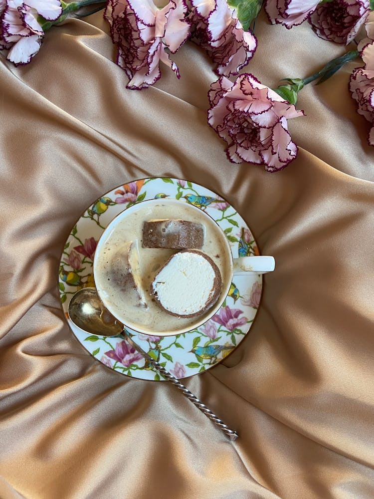 Cup Of Coffee With Ice Cream On Textile