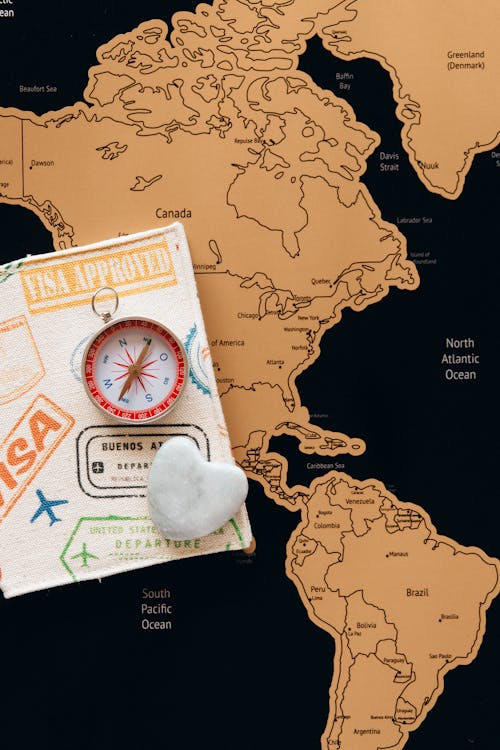 Free A Passport and a Compass Stock Photo