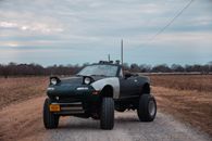A Vehicle Parked on Unpaved Road