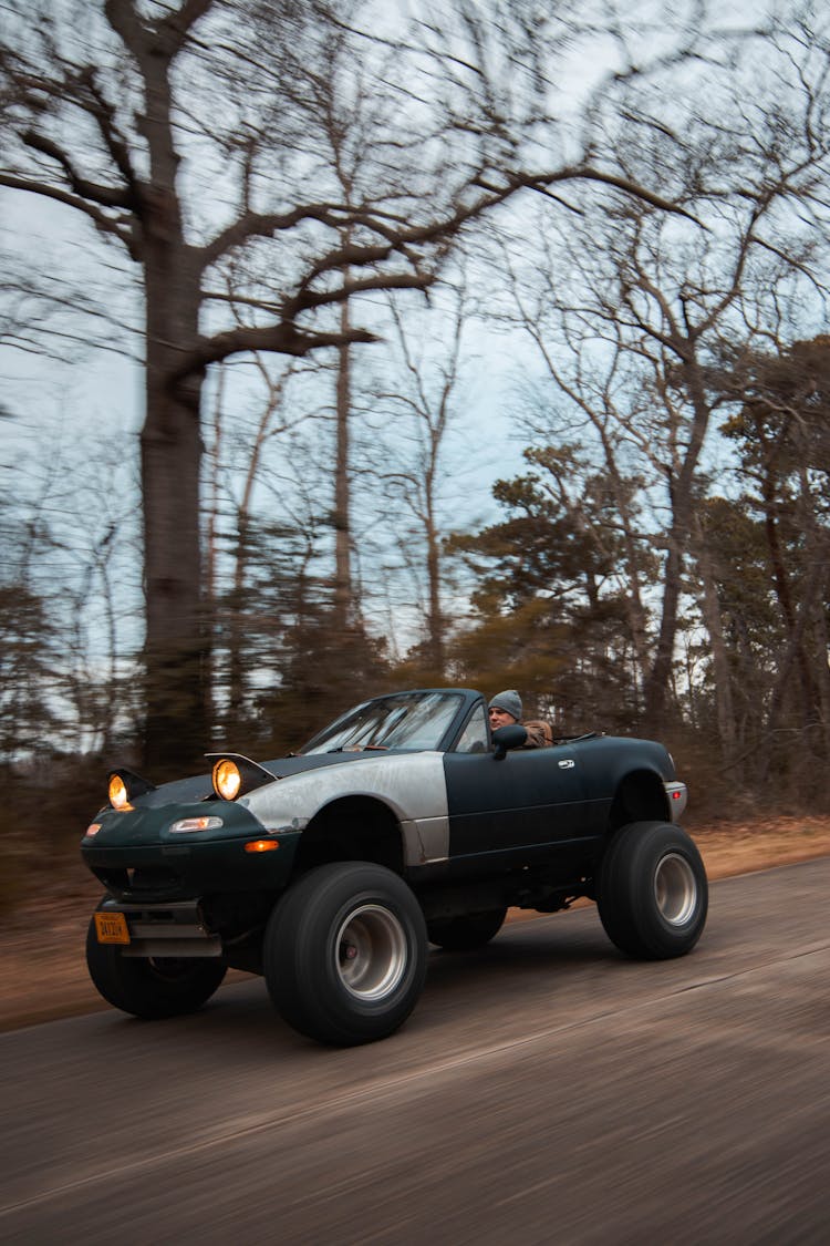 Man Driving A Drag Car In Fall