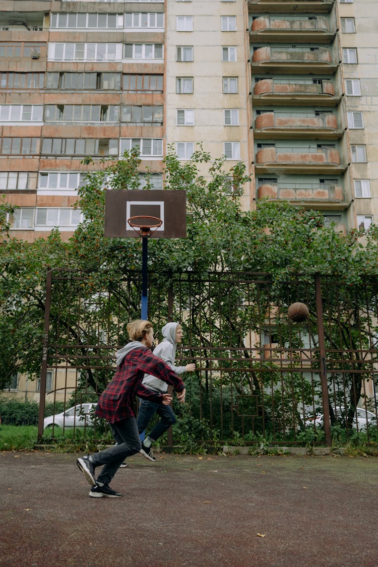 Brothers Playing Basketball