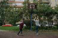 Brothers Playing Basketball