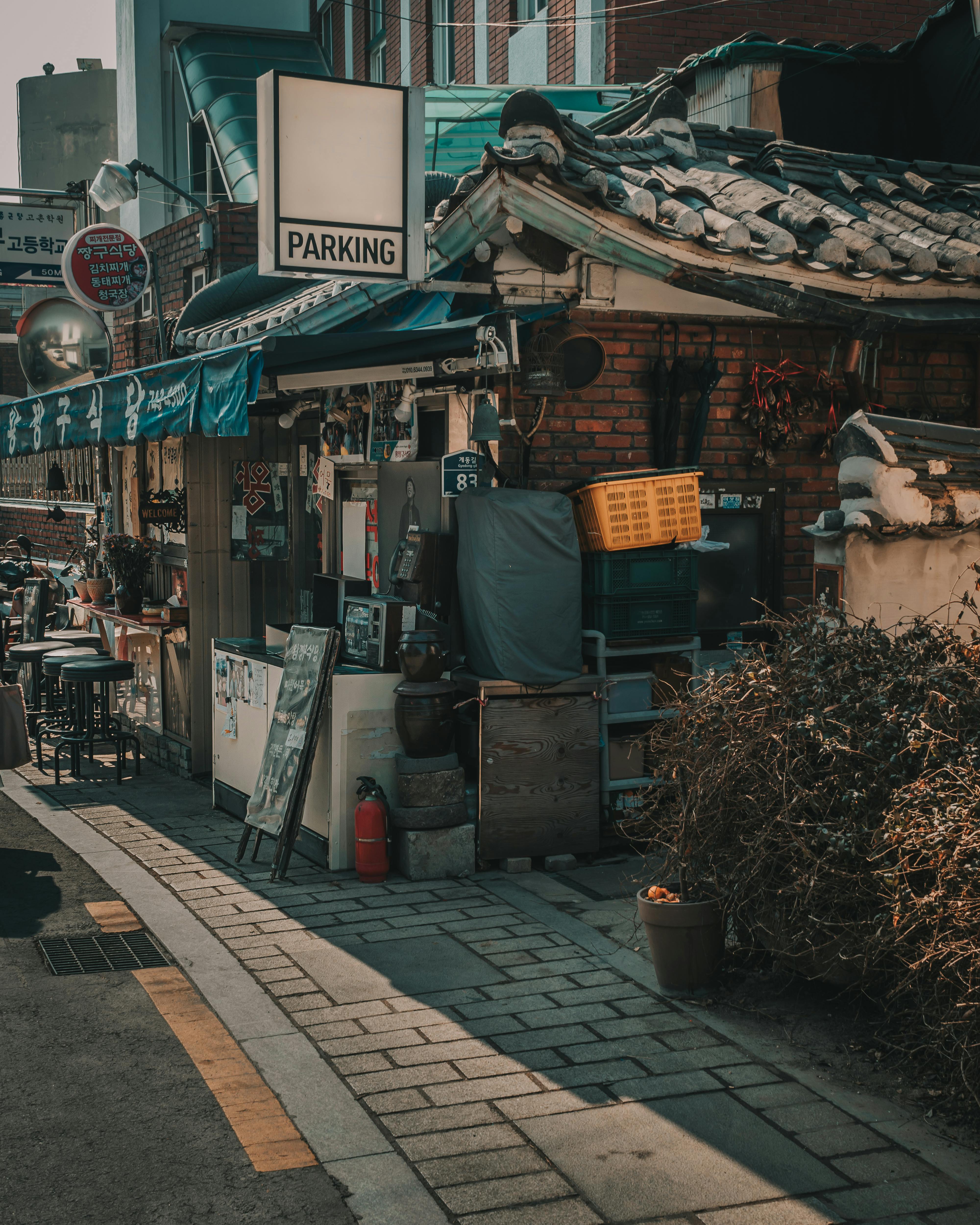 old thing beside wall of street food restaurant