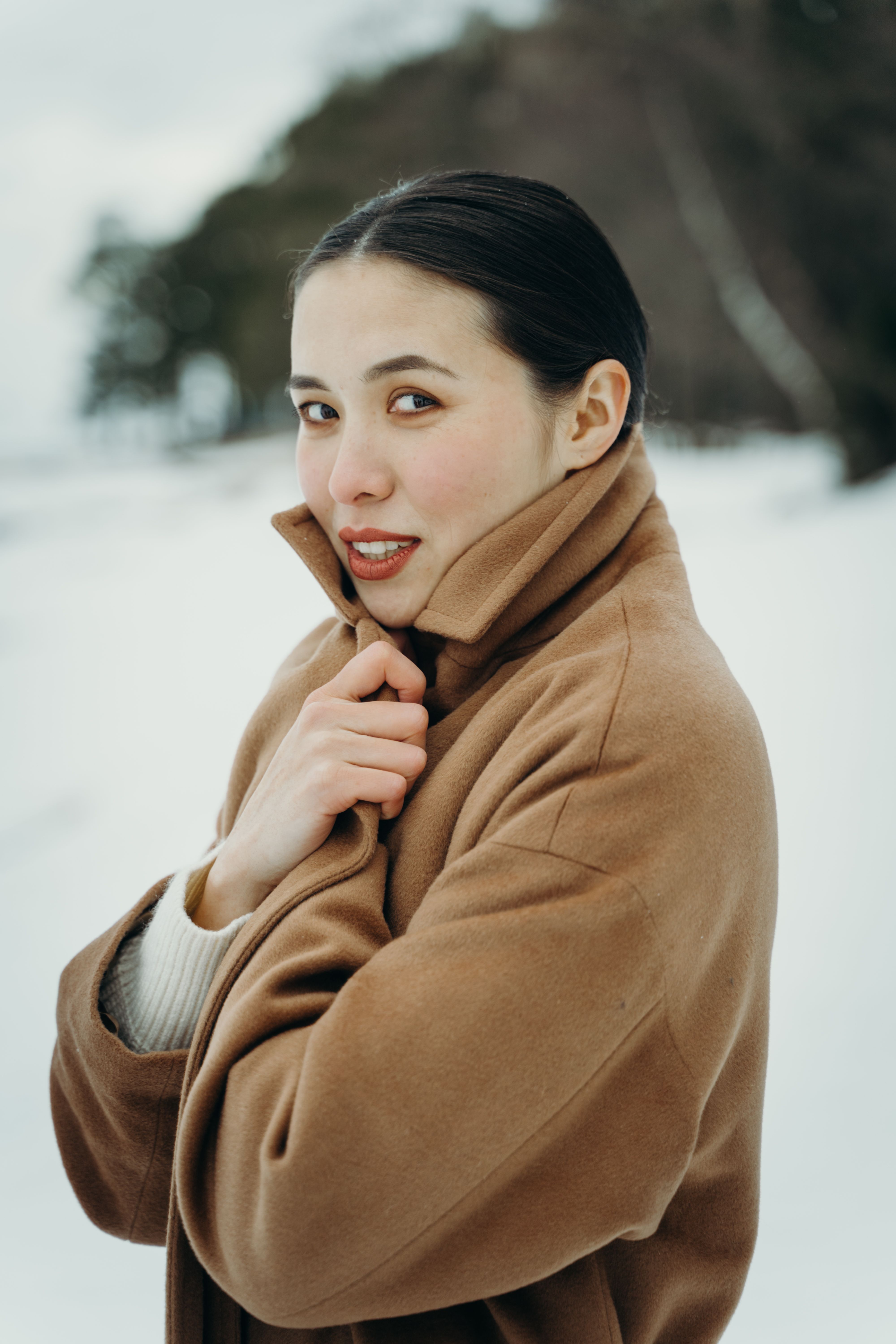 Photo of a Woman in a Brown Coat Walking · Free Stock Photo
