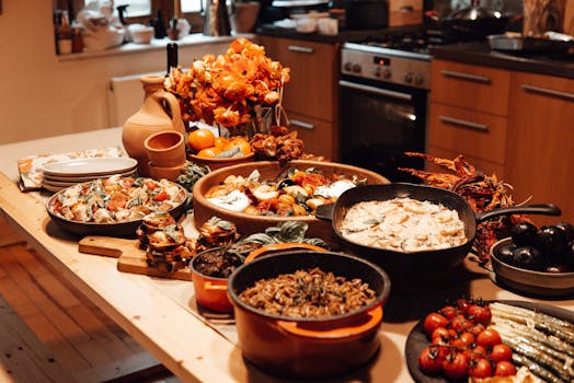 A colorful array of home-cooked dishes displayed on a rustic wooden table, perfect for a cozy gathering.