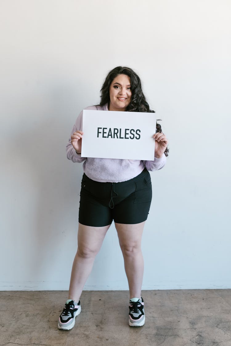 Woman Holding A Placard