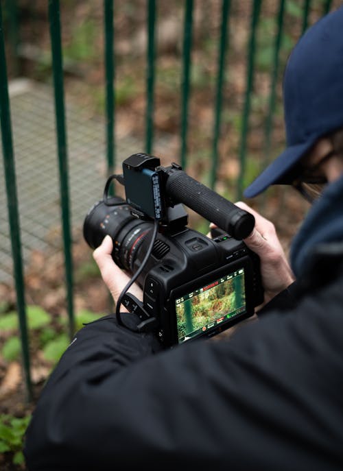 A Person Holding a Video Camera