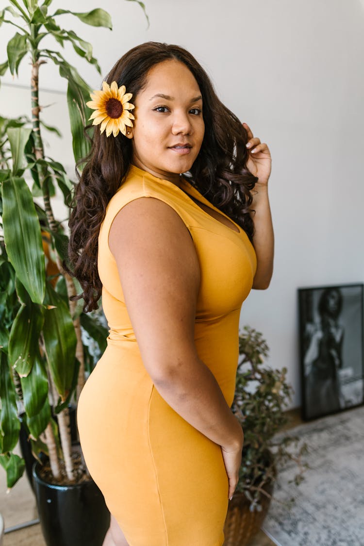 A Woman Wearing Orange Dress