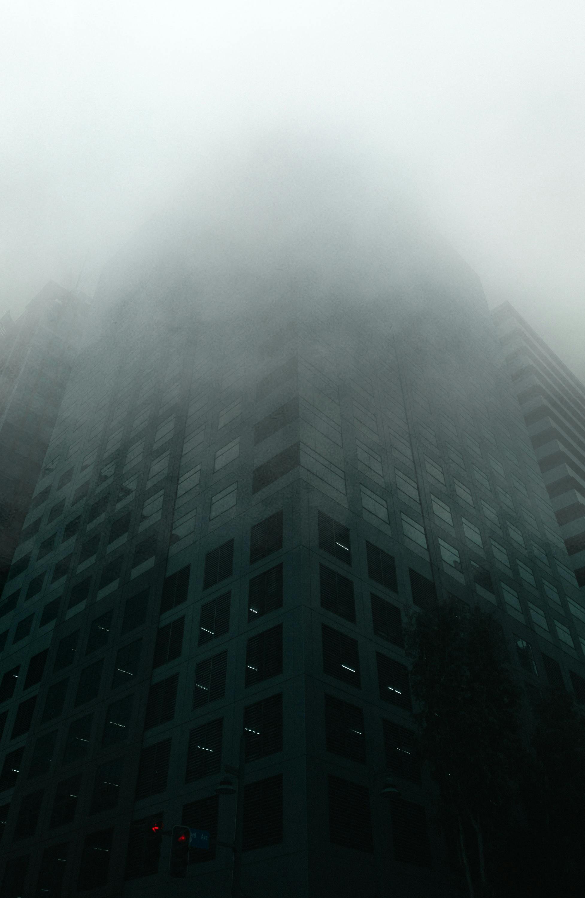 modern multistory building in foggy weather