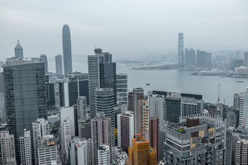 Free Elevated view of Hong Kong's modern skyscrapers and Victoria Harbor. Stock Photo