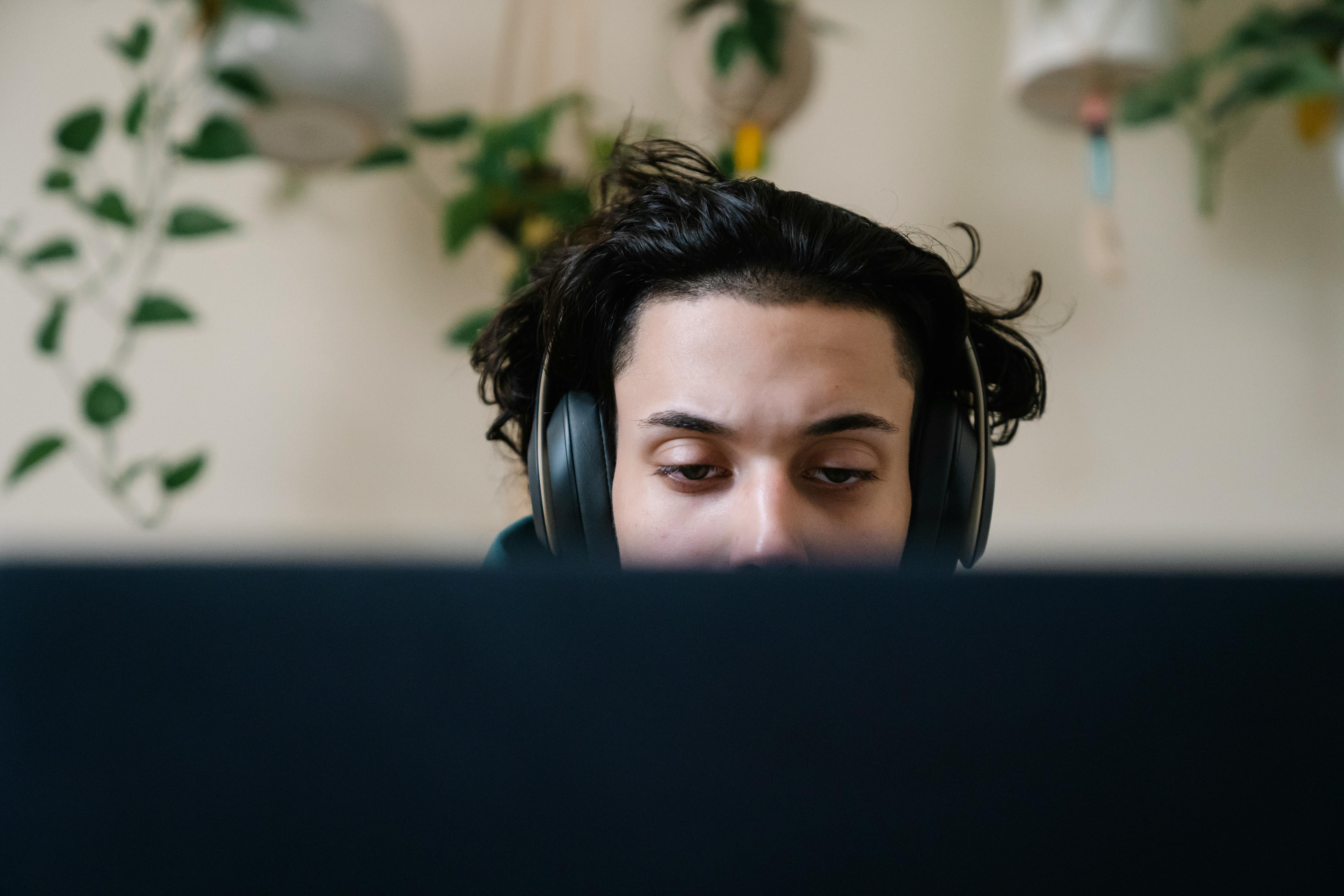 person working from home with calm, focused expression