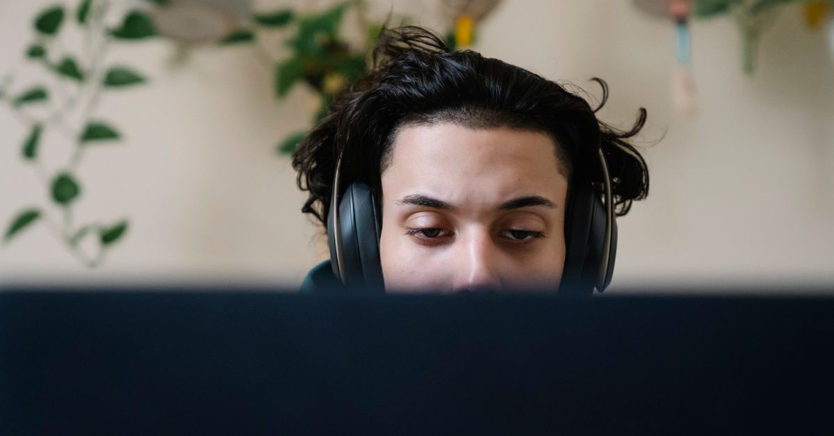 person working from home with calm, focused expression