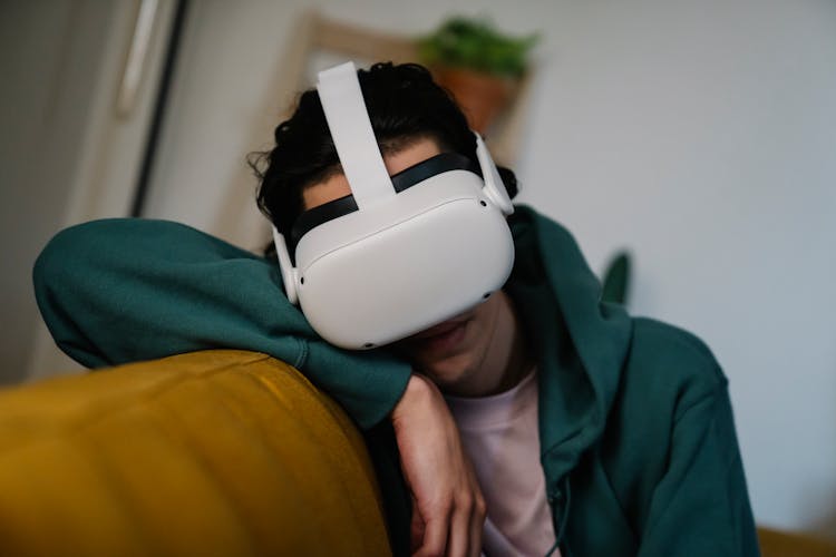 Man In VR Goggles Watching Virtual Reality