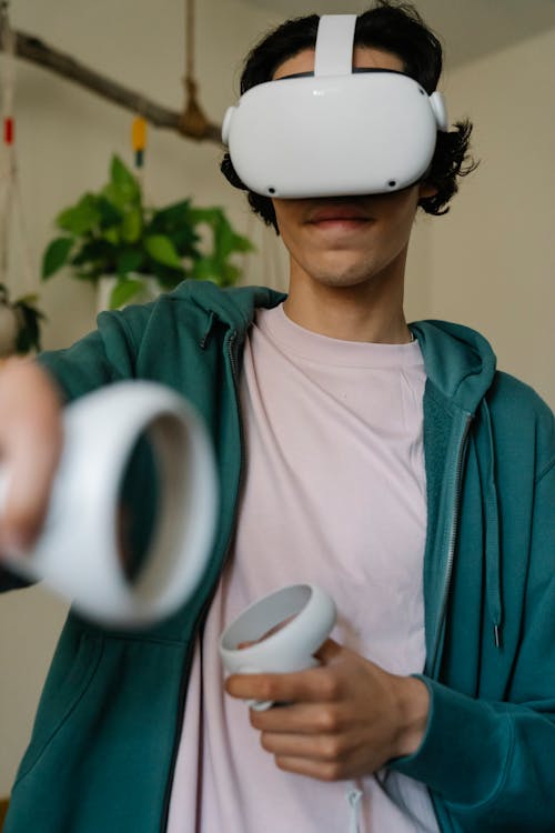 Gamer in VR headset playing video game in room