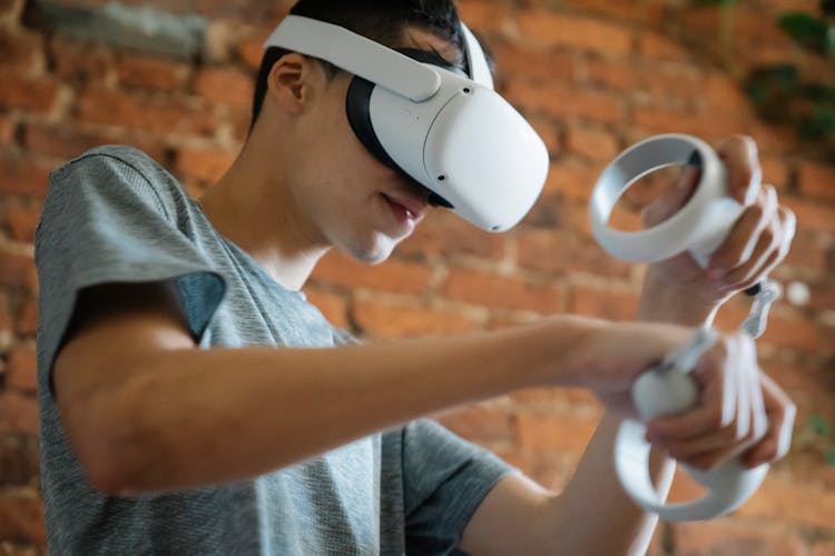 Young Man Using VR Goggles