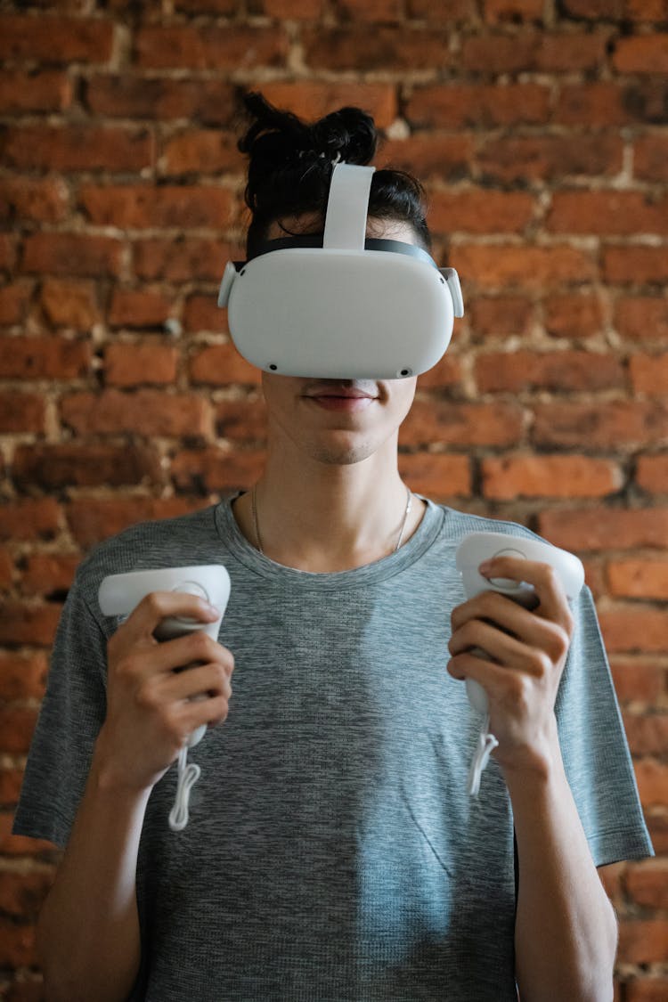 Man Smiling While Playing Game In Virtual Reality