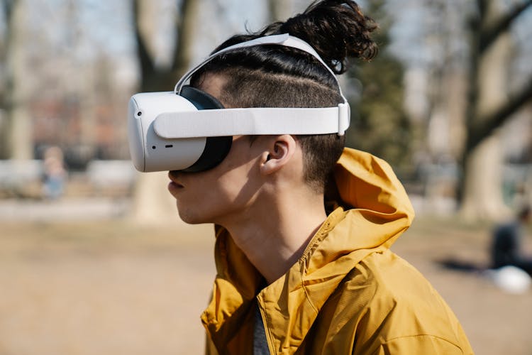 Cool Man In VR Headset In Urban Park