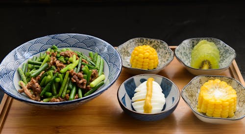 Free Egg, Corn, Kiwi With Bowls Stock Photo