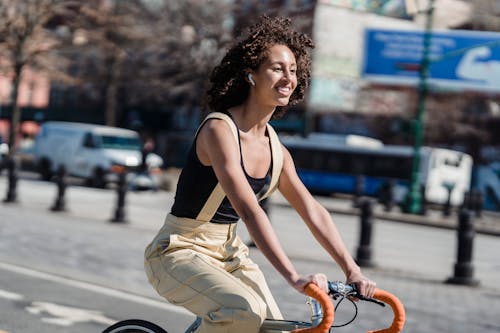 A Woman Riding a Road Bike