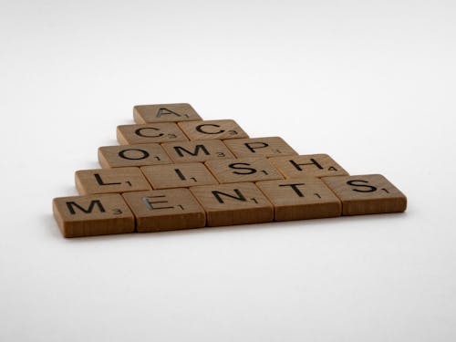 Free Wooden Scrabble Tiles on the White Background Stock Photo