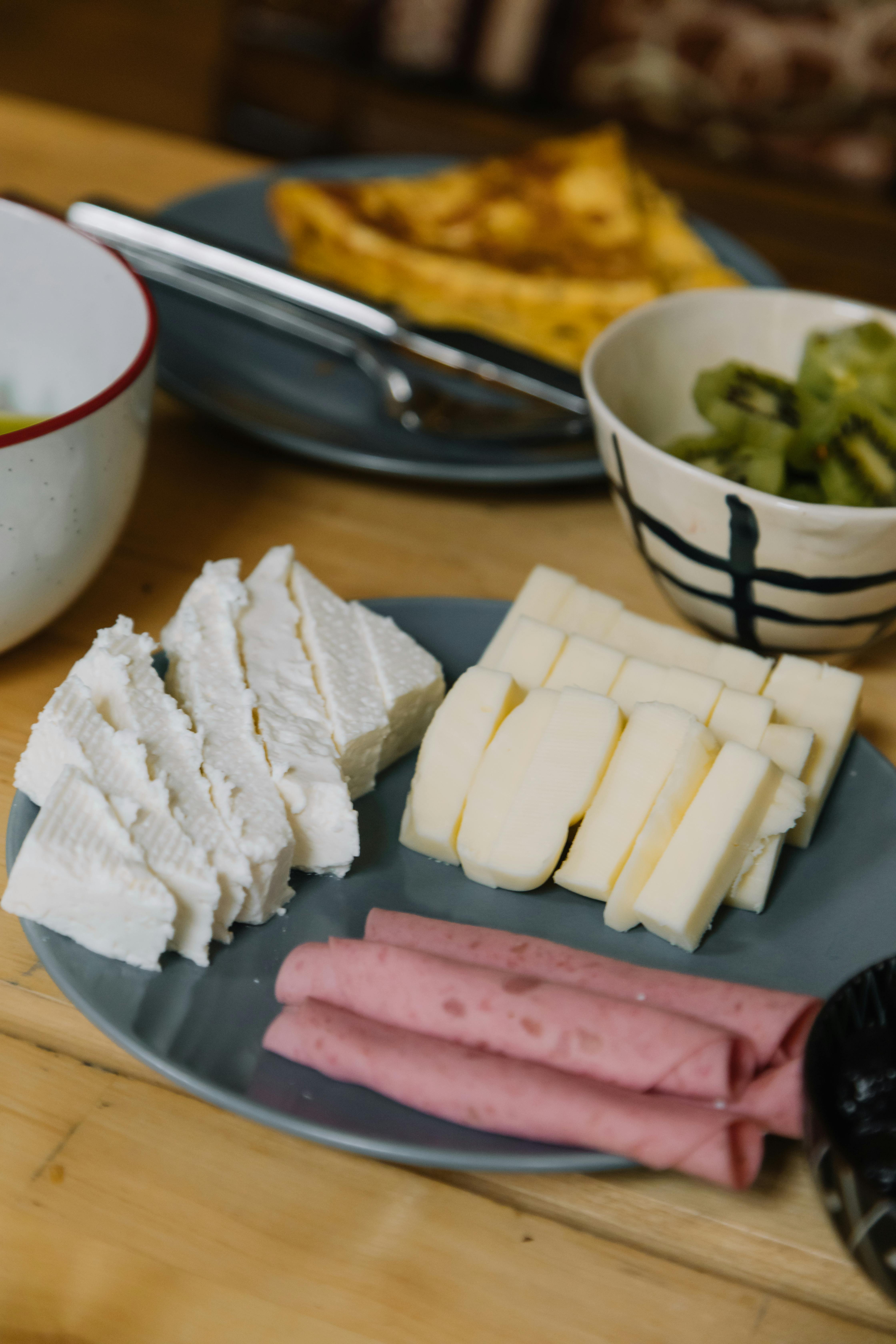 white cheese on black plate