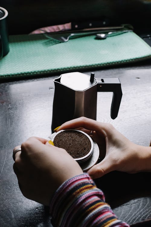 Free Person Making Coffee in Mocha Stock Photo