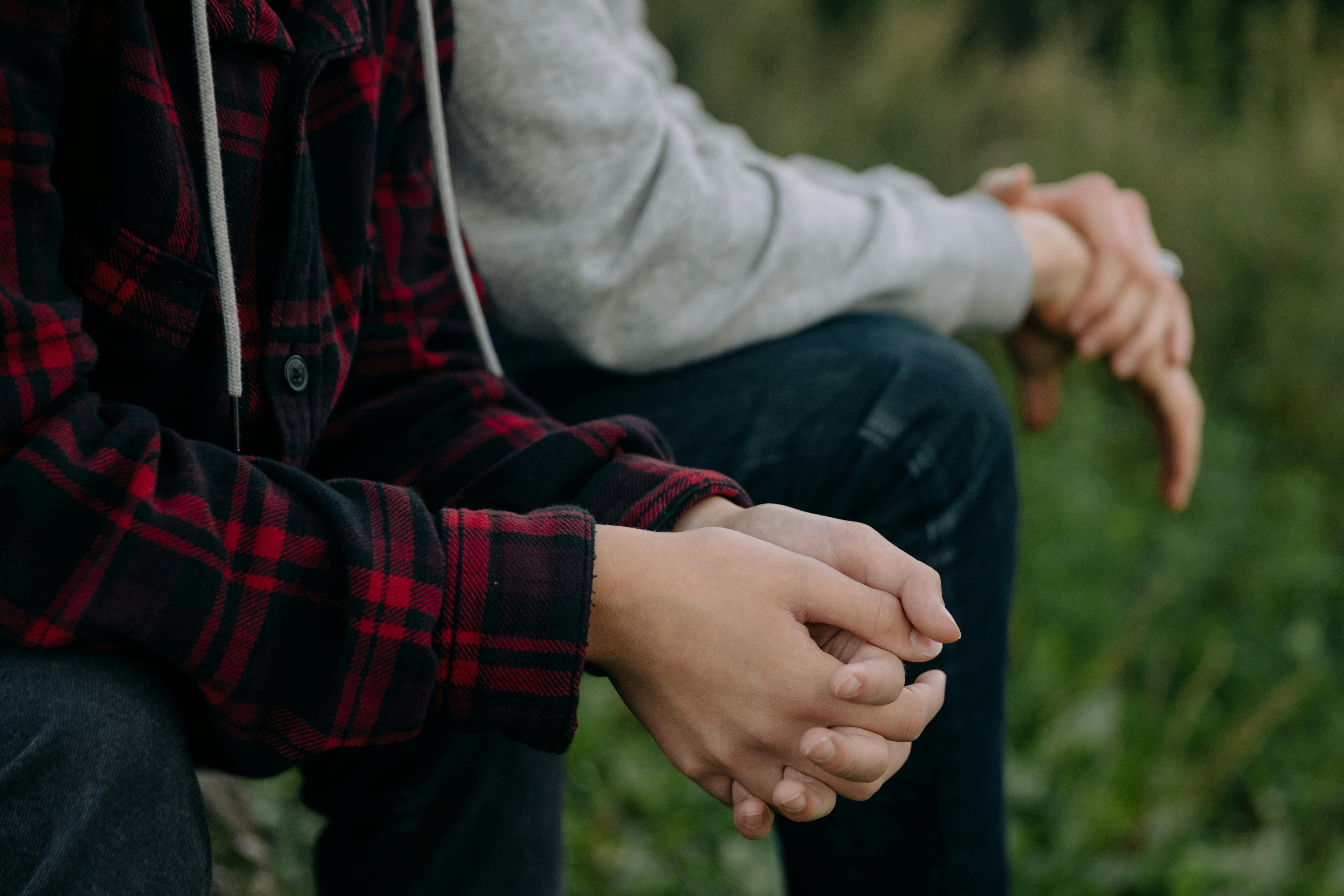 A Person Interlocking Fingers · Free Stock Photo