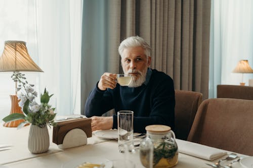 Elderly Man Drinking Tea