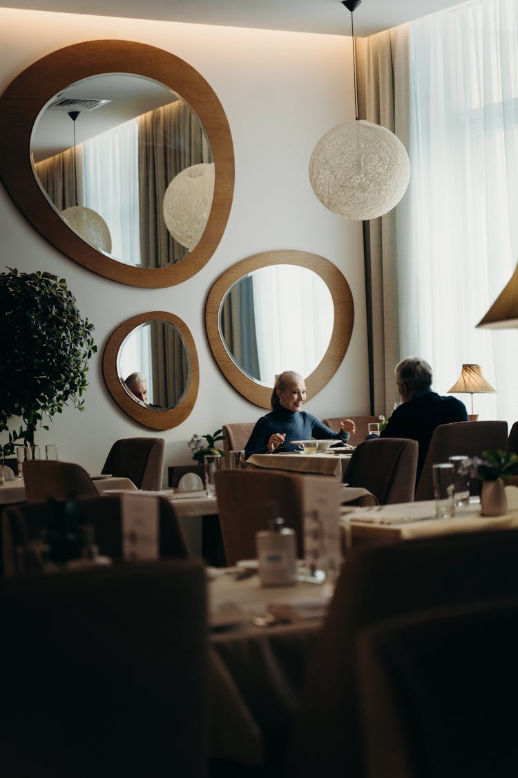 
A Couple Dining In A Restaurant