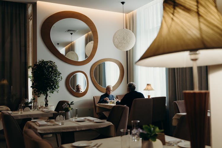 
A Couple Dining In A Restaurant