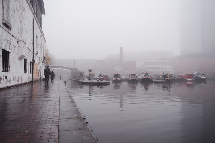 Boats Moored On Water Canal In Port