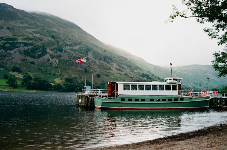 Ferry Moored On River Near Shore