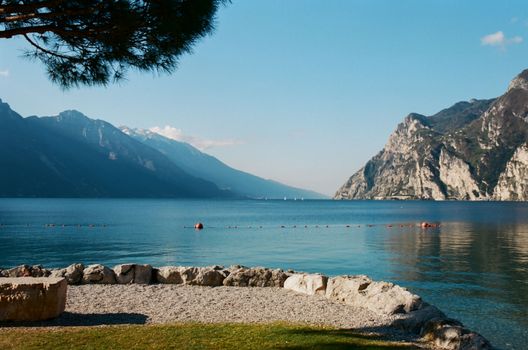 Scenic view of sea bay near rough mountains