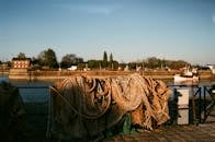 Fishing nets hanging on pier