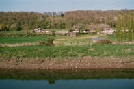 Rural houses near lake in countryside