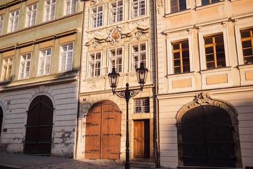 Old stone building facades with ornament in town