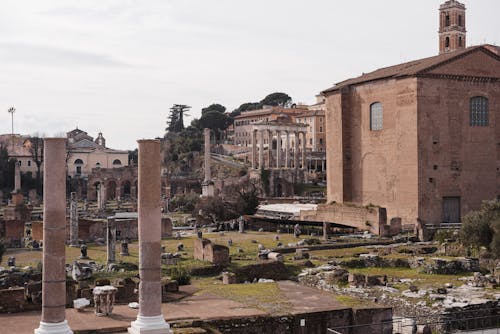 Roman Forum with old building facades and columns in city