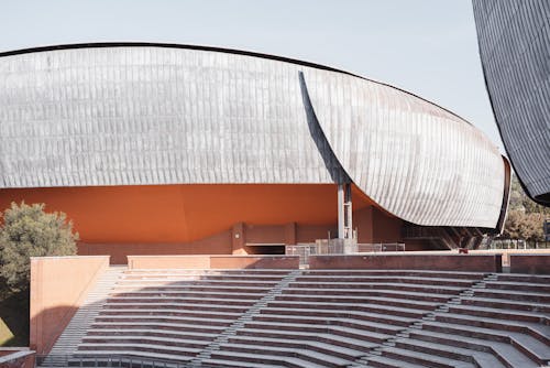 Modern music complex facades and staircase in city