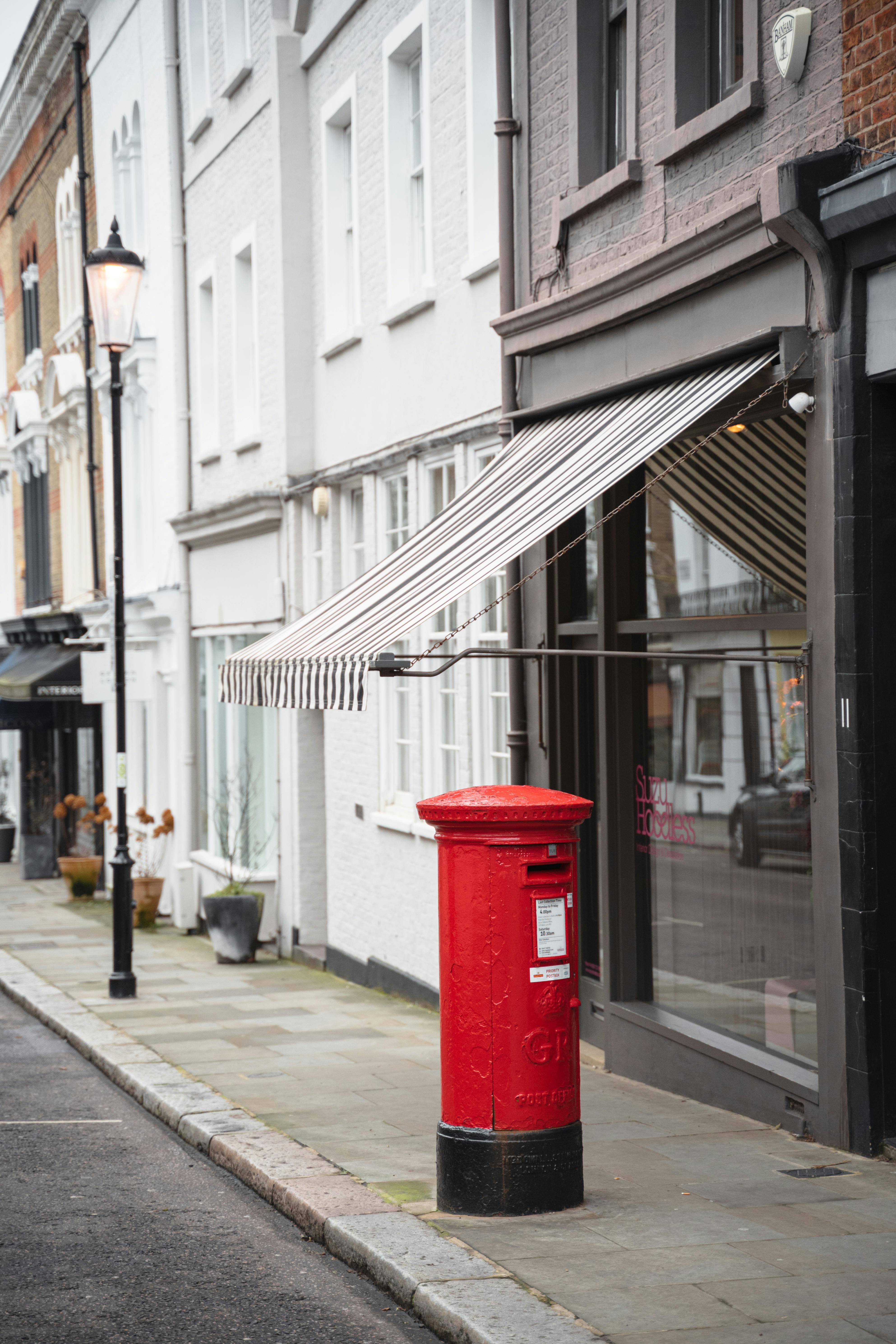 post box near building on street