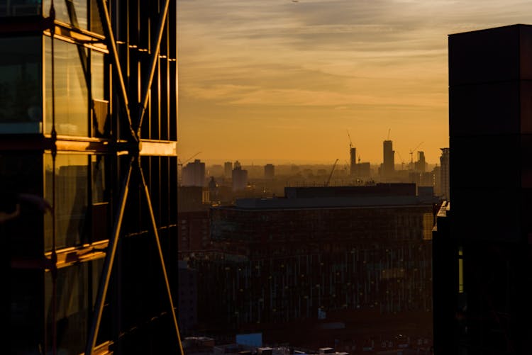 Sunset Sky Over Megapolis With Modern Architecture