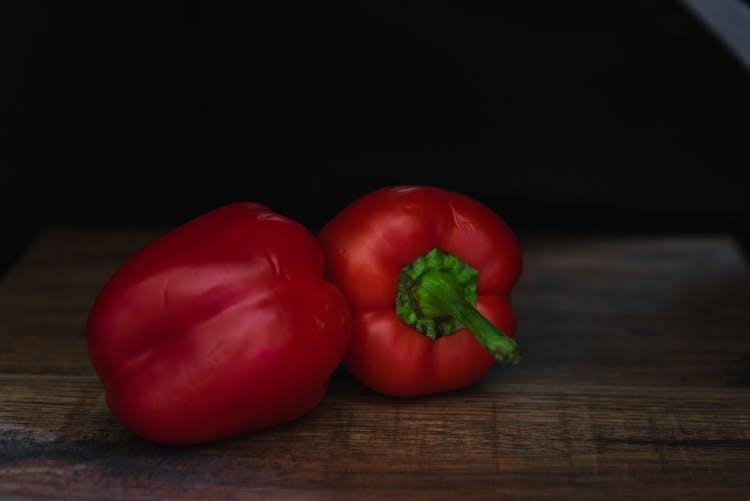 Tasty Fresh Red Sweet Bell Peppers On Table