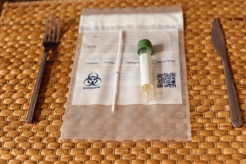 Swab Testing Kit on a Straw Placemat