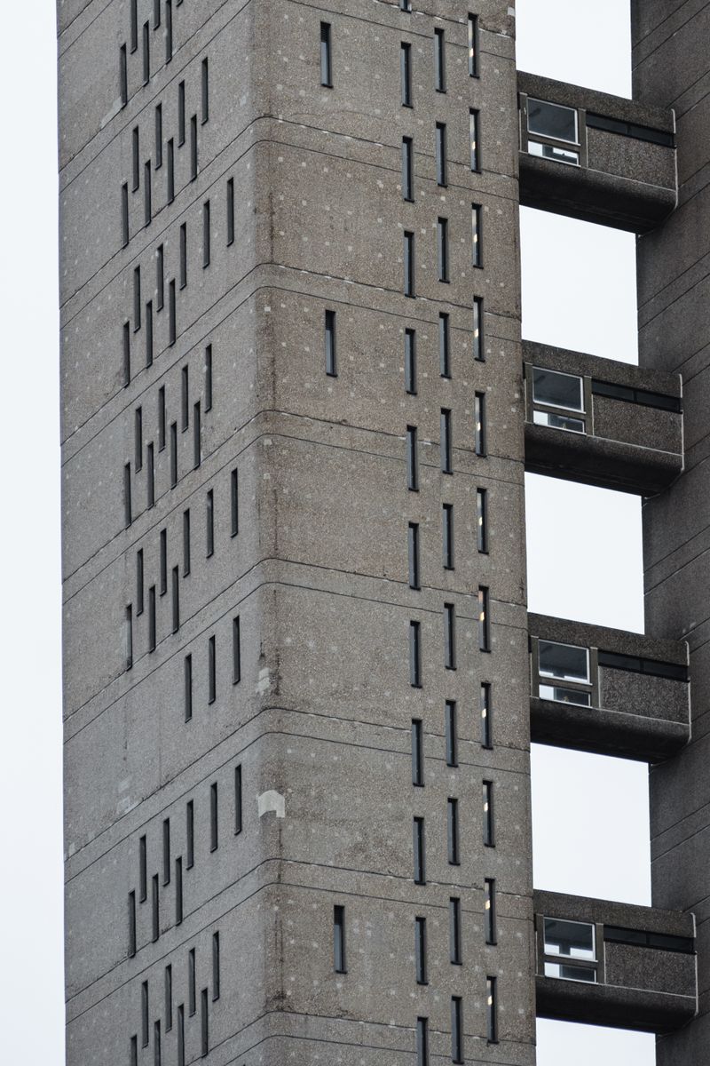 Corner of a concrete tower block — Olga Lioncat on Pexels