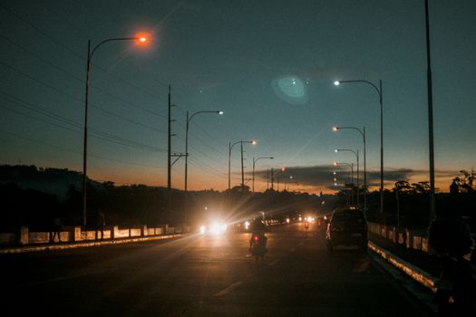 Vehicles on the Road at Night