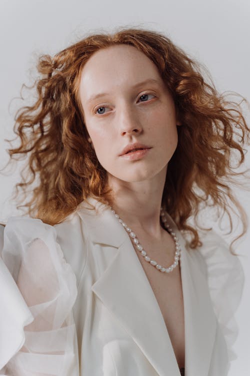 A Woman with Curly Ginger Hair