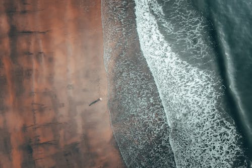 Aerial View of a Person on the Beach