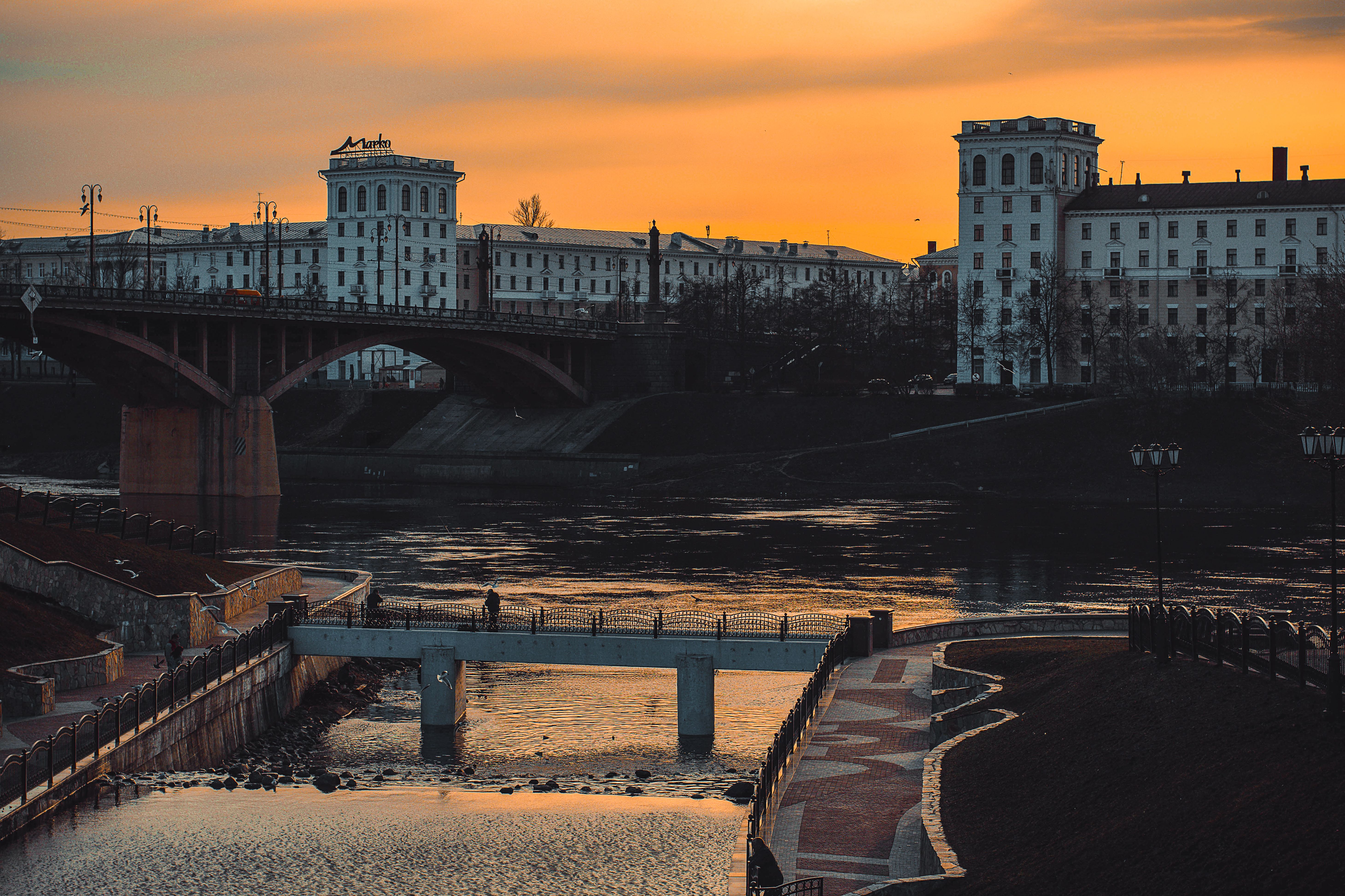 Bridge Near High-rise Building · Free Stock Photo