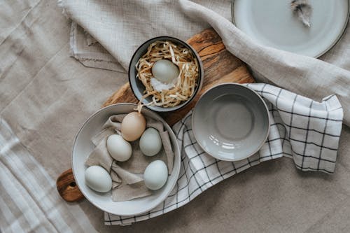 White Eggs on Brown Wooden Bowl