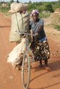 Man in Black Polo Shirt Riding on Bicycle